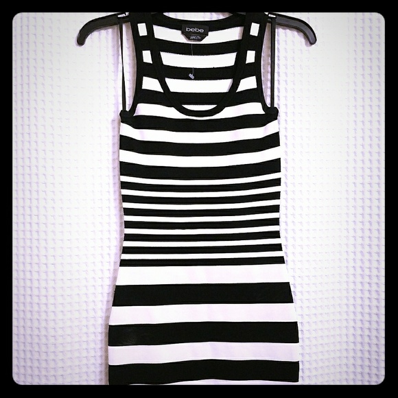 bebe Dresses & Skirts - **SOLD** BEBE Black & White Striped Bandage Dress